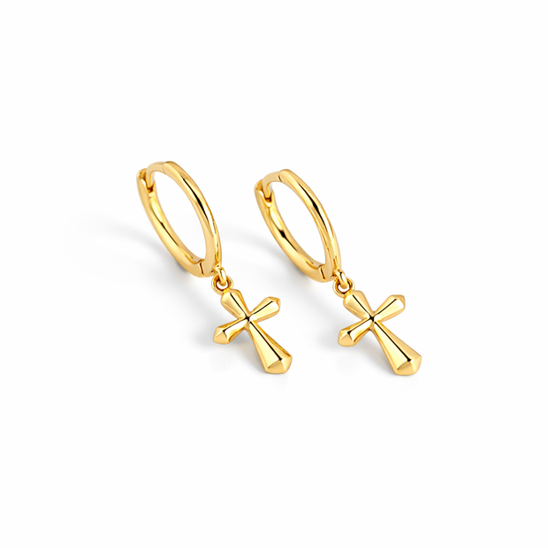 Gold hoop earrings with cross pendants on a white background