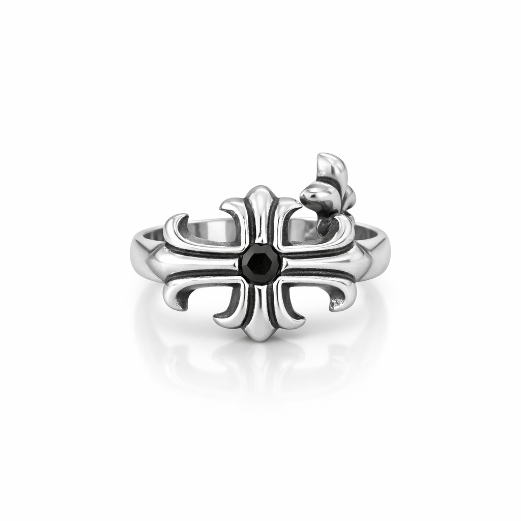 Silver ring with black gemstone on a white background