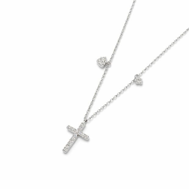 Silver necklace with a cross pendant on a white background